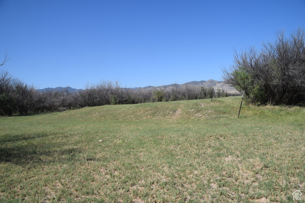 Exterior space featuring a rural view and a mountain view