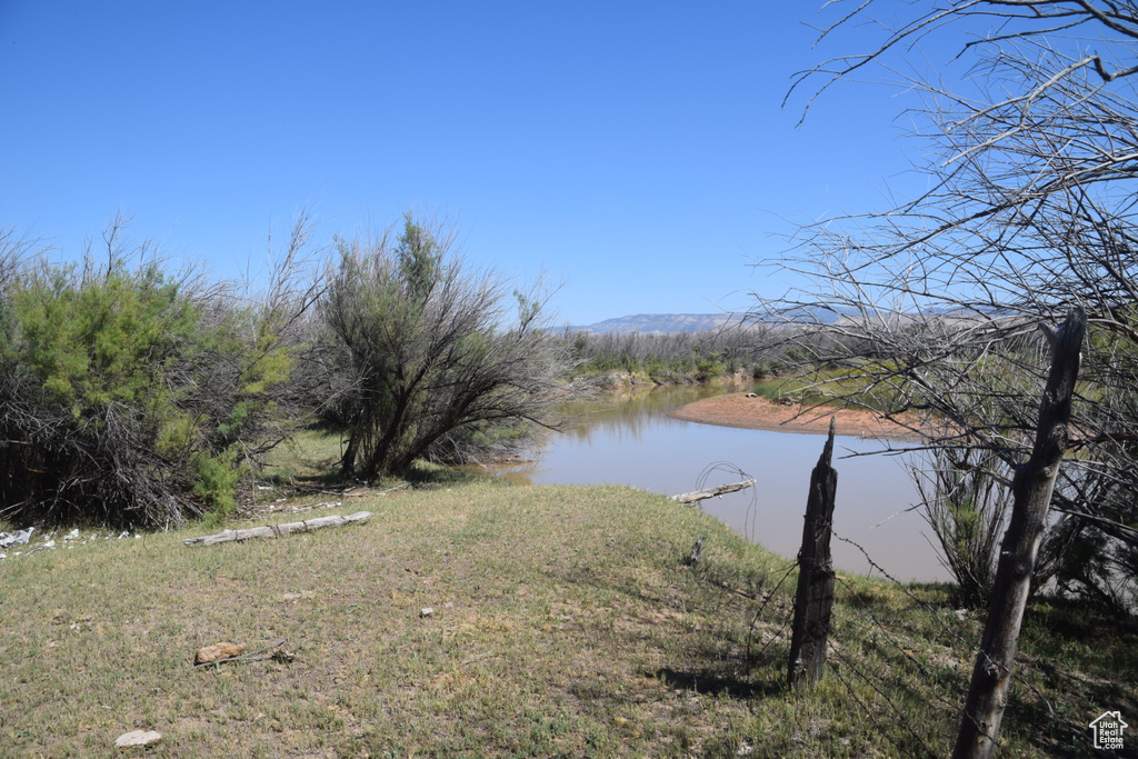 Property view of water with a mountain view