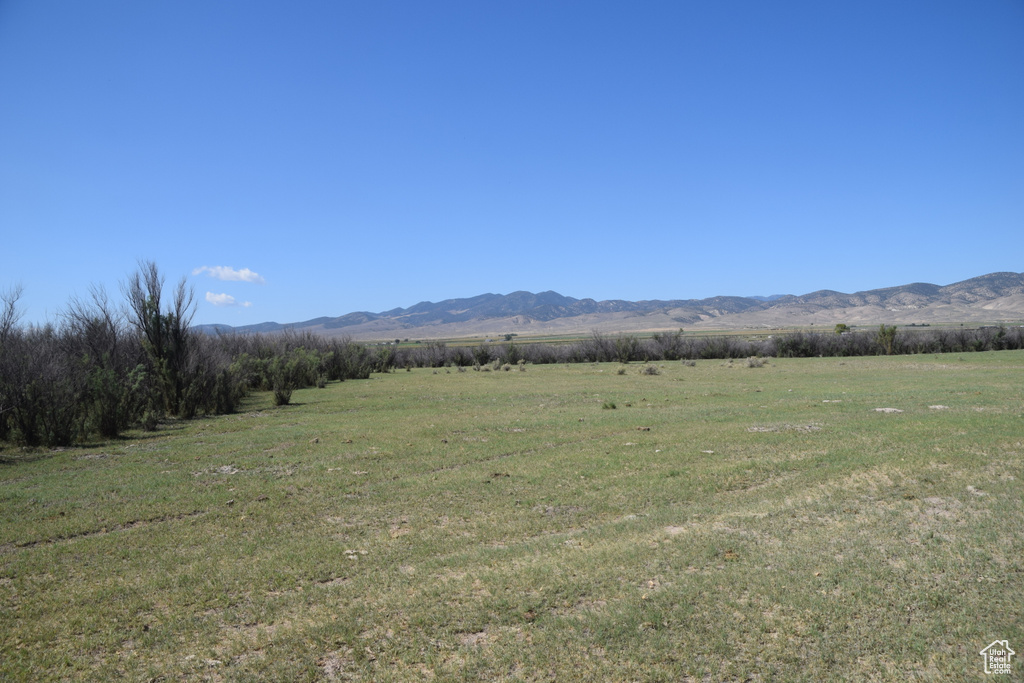View of mountain feature with a rural view