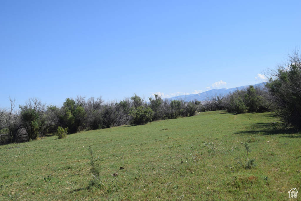 Exterior space featuring a rural view and a mountain view