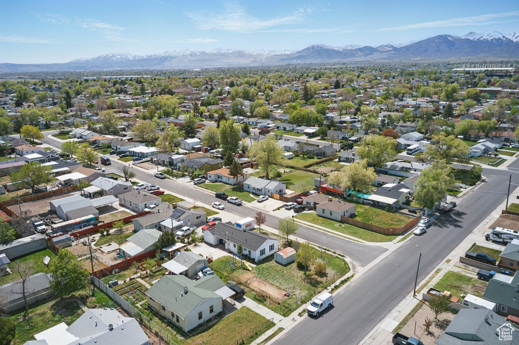 Drone / aerial view with a residential view and a mountain view