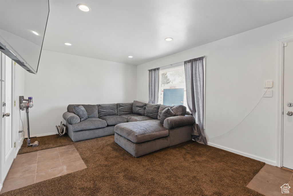 Living room featuring recessed lighting, carpet flooring, and baseboards