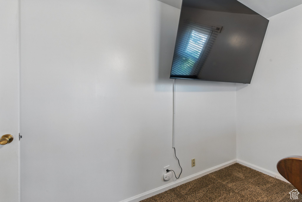 Details featuring carpet floors and baseboards