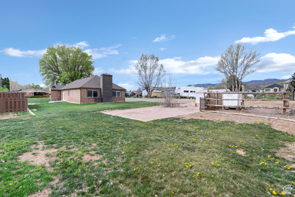 View of yard with fence