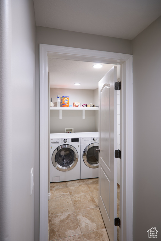 Laundry area with laundry area and washing machine and dryer