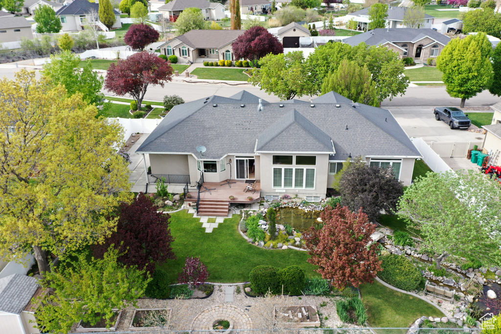 Birds eye view of property with a residential view