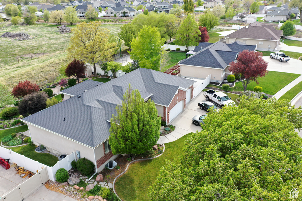 Birds eye view of property with a residential view