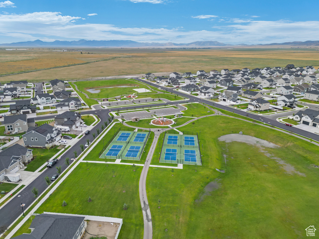 Birds eye view of property featuring a mountain view and a residential view