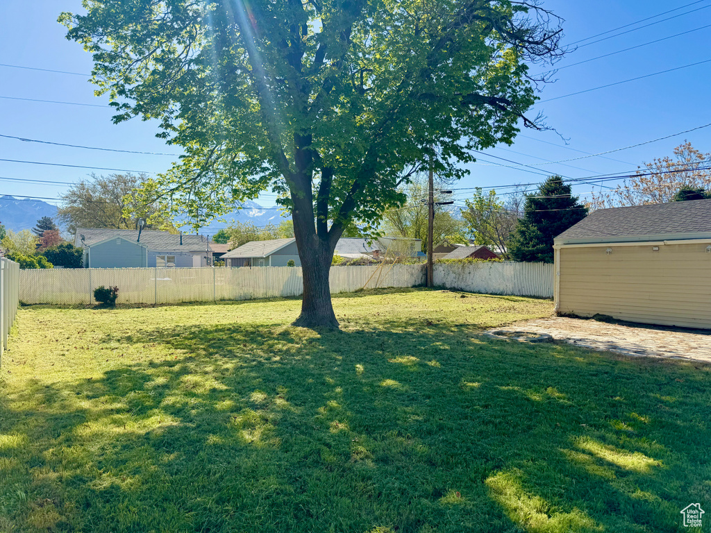 View of yard featuring a fenced backyard