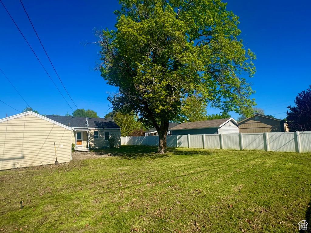 View of yard with fence