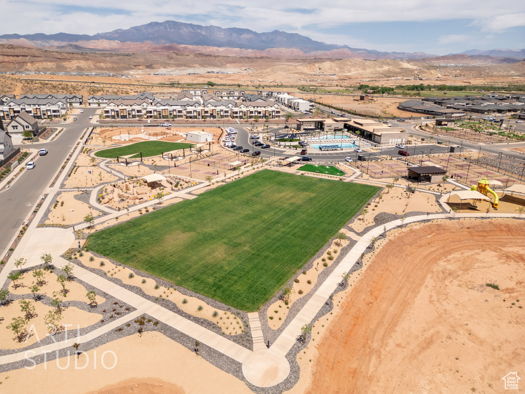 Drone / aerial view with a residential view and a mountain view