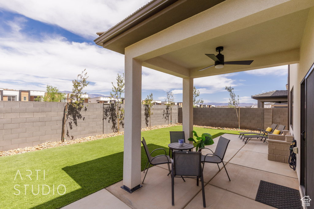View of patio / terrace featuring ceiling fan and a fenced backyard