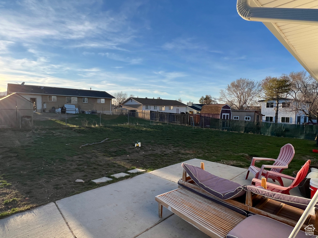 View of patio featuring a residential view and a fenced backyard