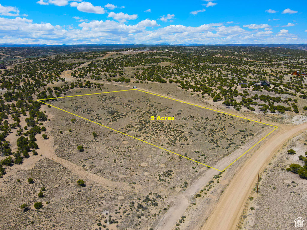 Overview of rural landscape featuring property boundaries highlighted and a desert landscape