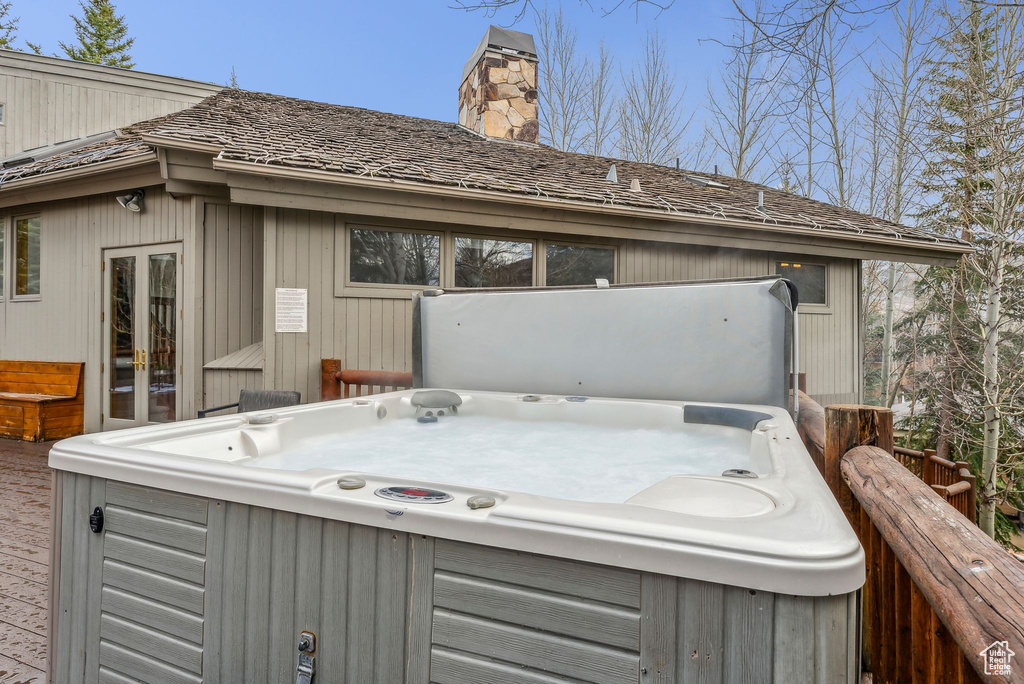 Wooden terrace with a hot tub