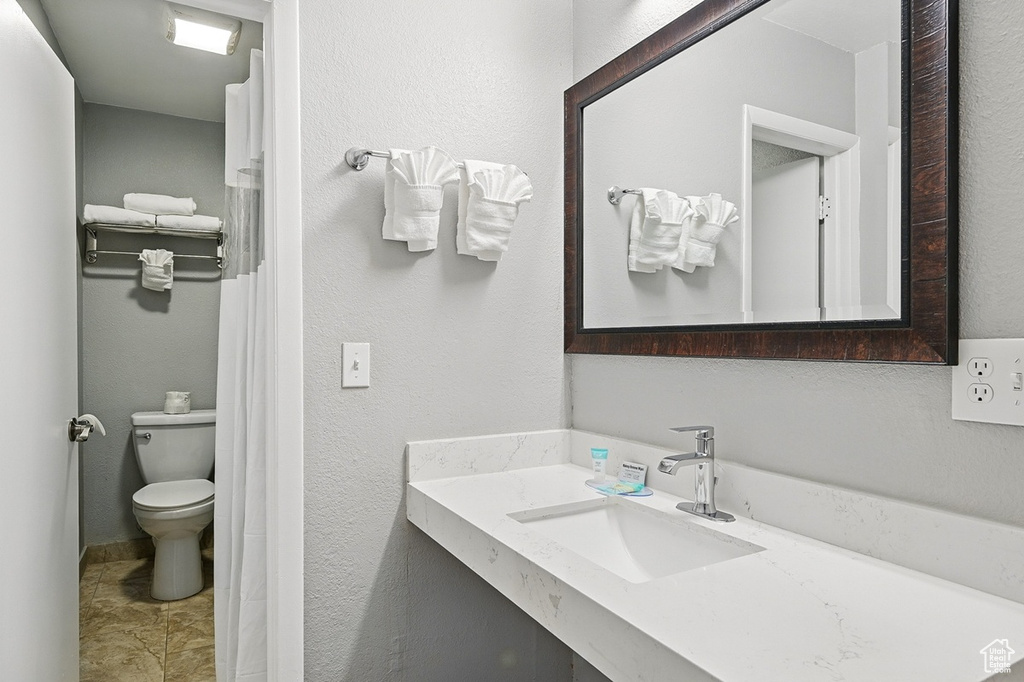 Bathroom with vanity and toilet
