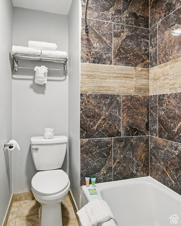 Full bath featuring walk in shower, a bath, toilet, and baseboards