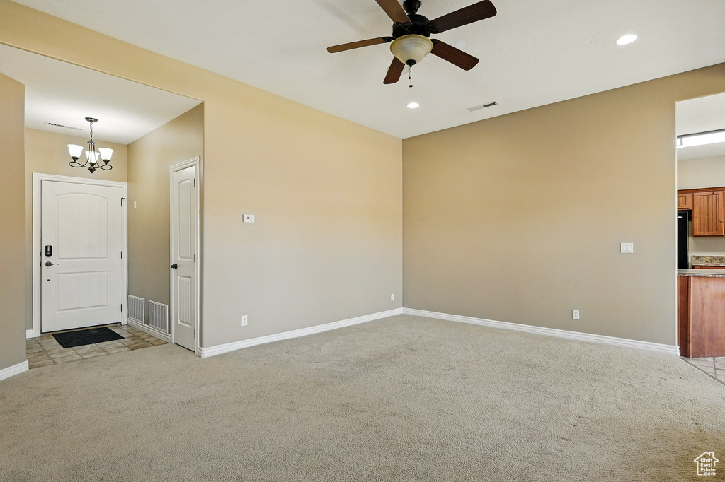Interior space featuring visible vents, recessed lighting, and light colored carpet
