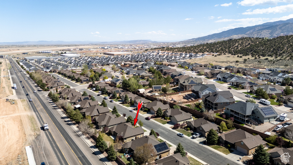 Birds eye view of property featuring a residential view and a mountain view