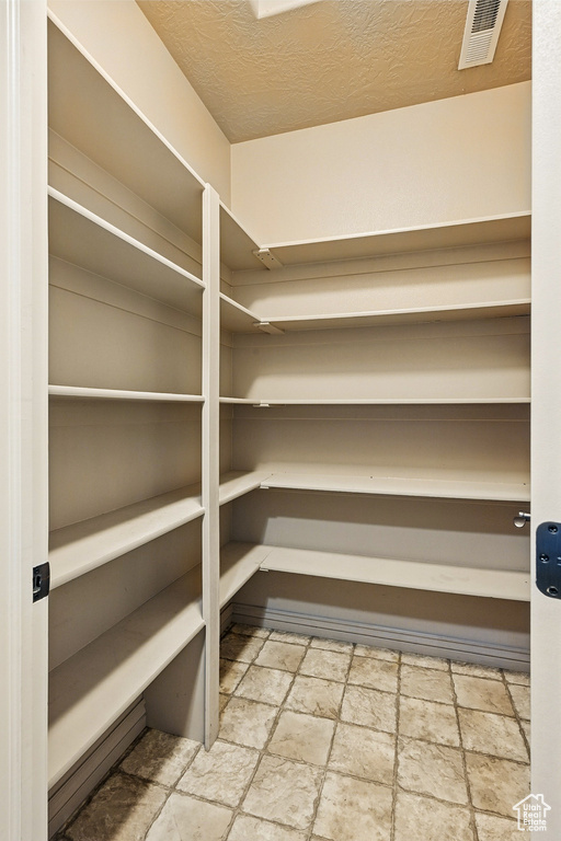 Pantry with visible vents