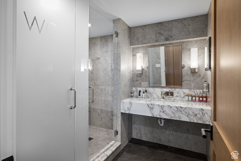 Full bath featuring vanity and a stall shower