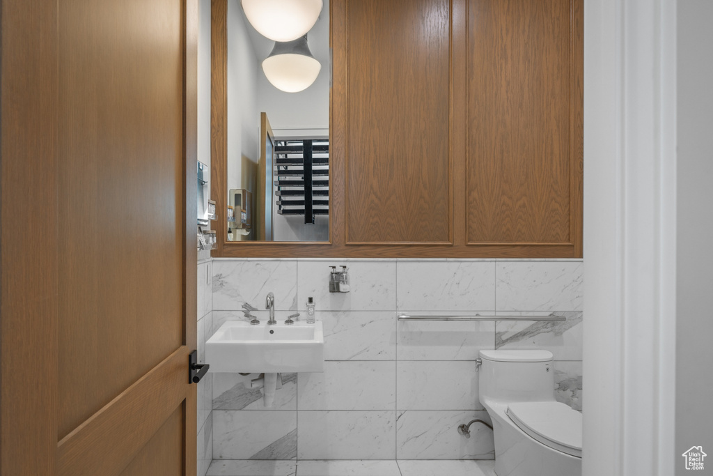 Bathroom featuring a sink and toilet