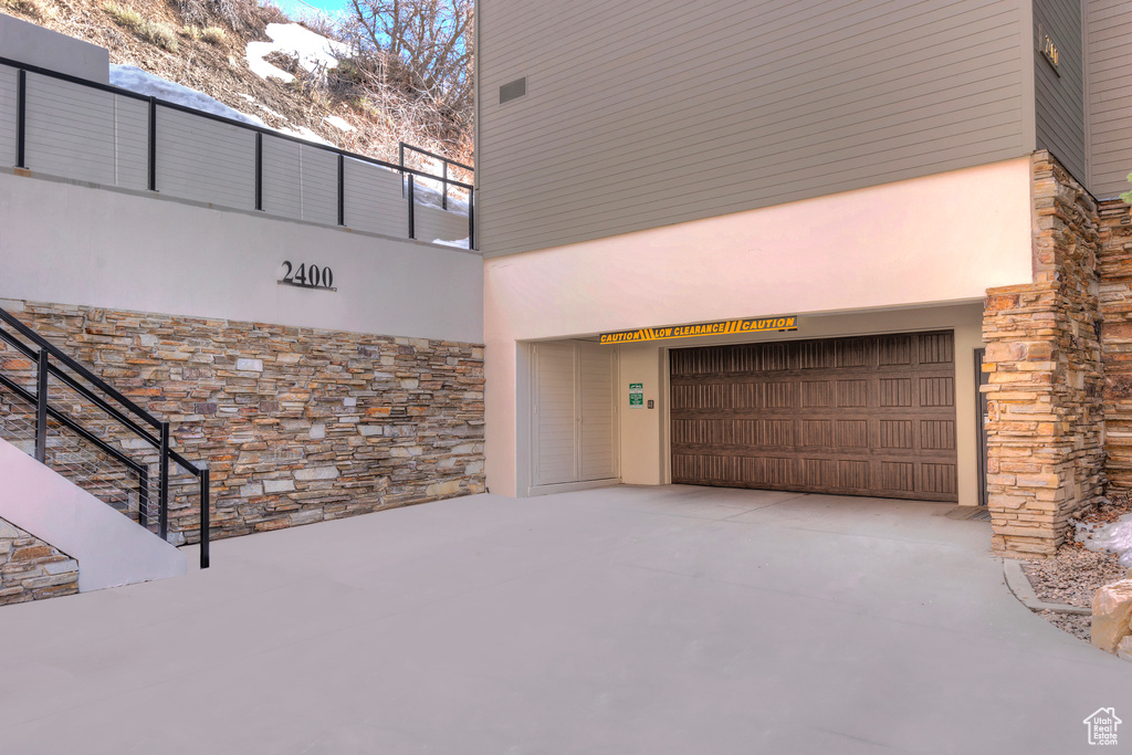 Exterior space with concrete driveway