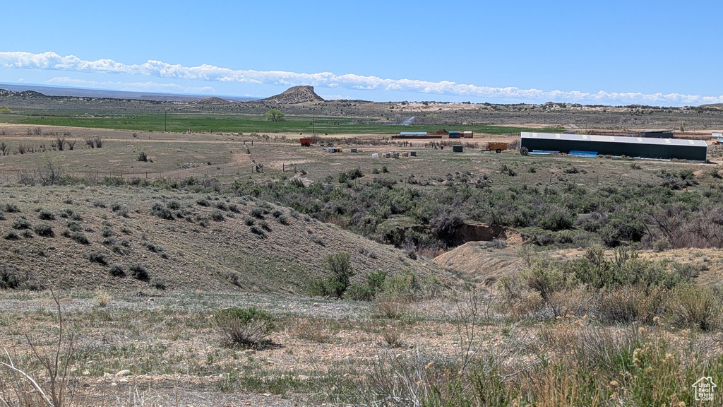 Property view of mountains featuring a rural view