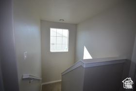 Stairs featuring baseboards