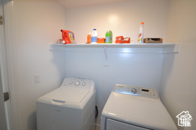 Laundry room featuring laundry area and washing machine and dryer