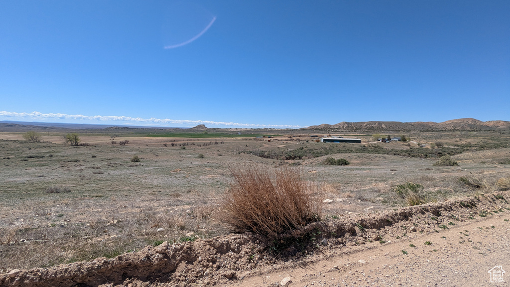 Property view of mountains featuring a rural view