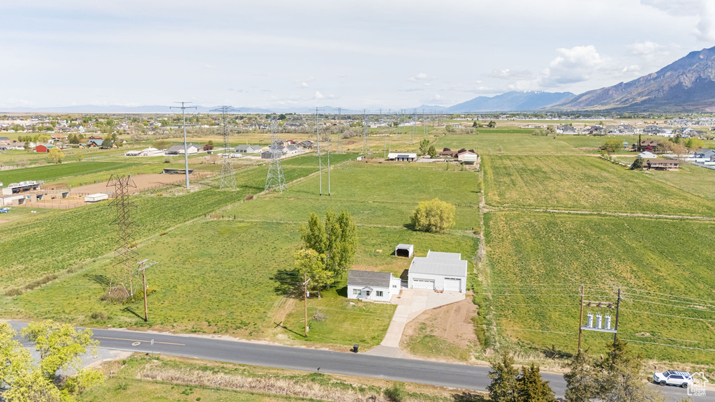 Drone / aerial view with a mountain view and a rural view