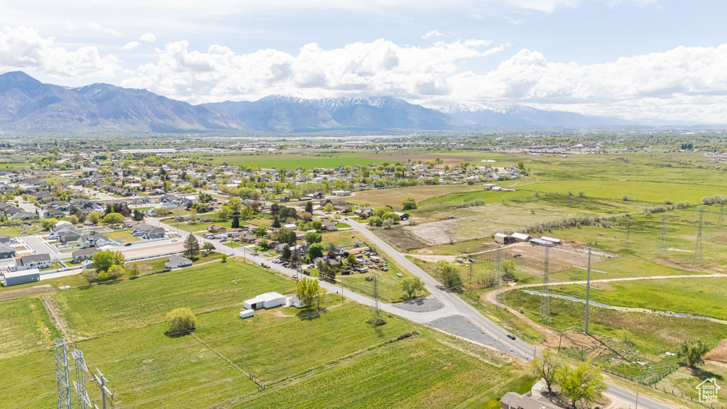Birds eye view of property with a mountain view