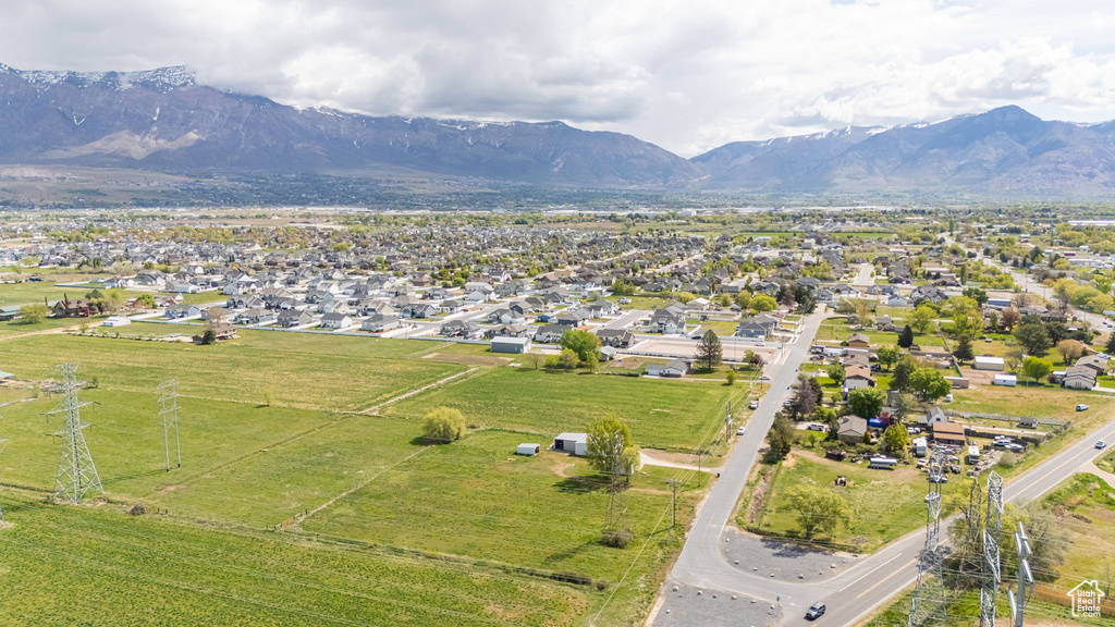 Drone / aerial view with a mountain view and a residential view