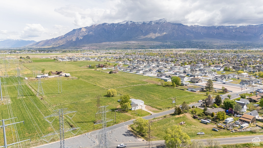 Birds eye view of property featuring a residential view and a mountain view