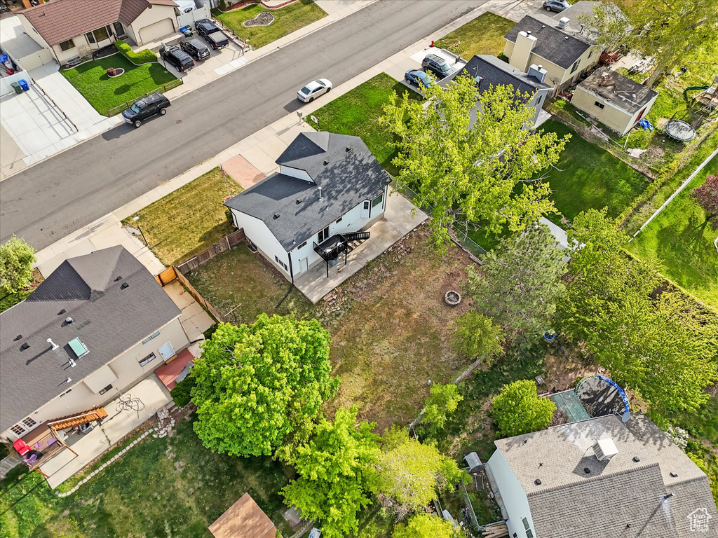 Birds eye view of property with a residential view