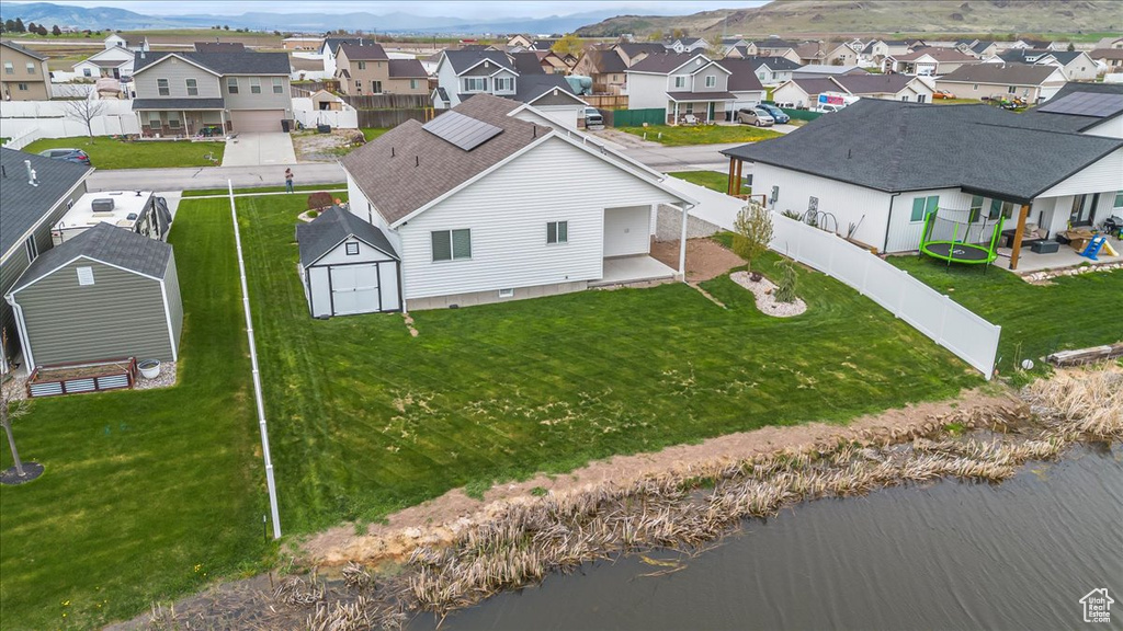 Drone / aerial view with a residential view and a mountain view