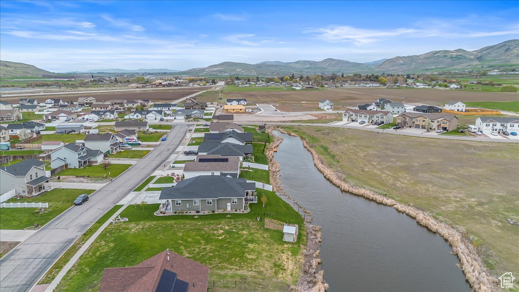 Bird's eye view with a residential view and a water and mountain view