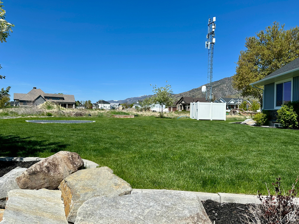 View of yard featuring a mountain view and a residential view
