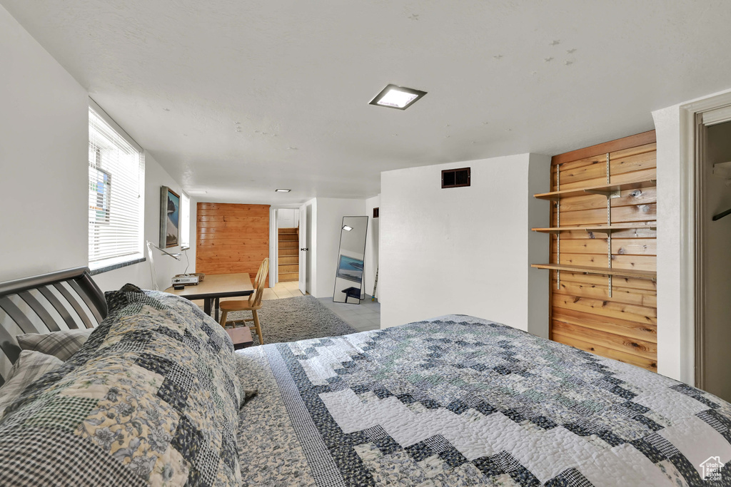 Bedroom featuring visible vents