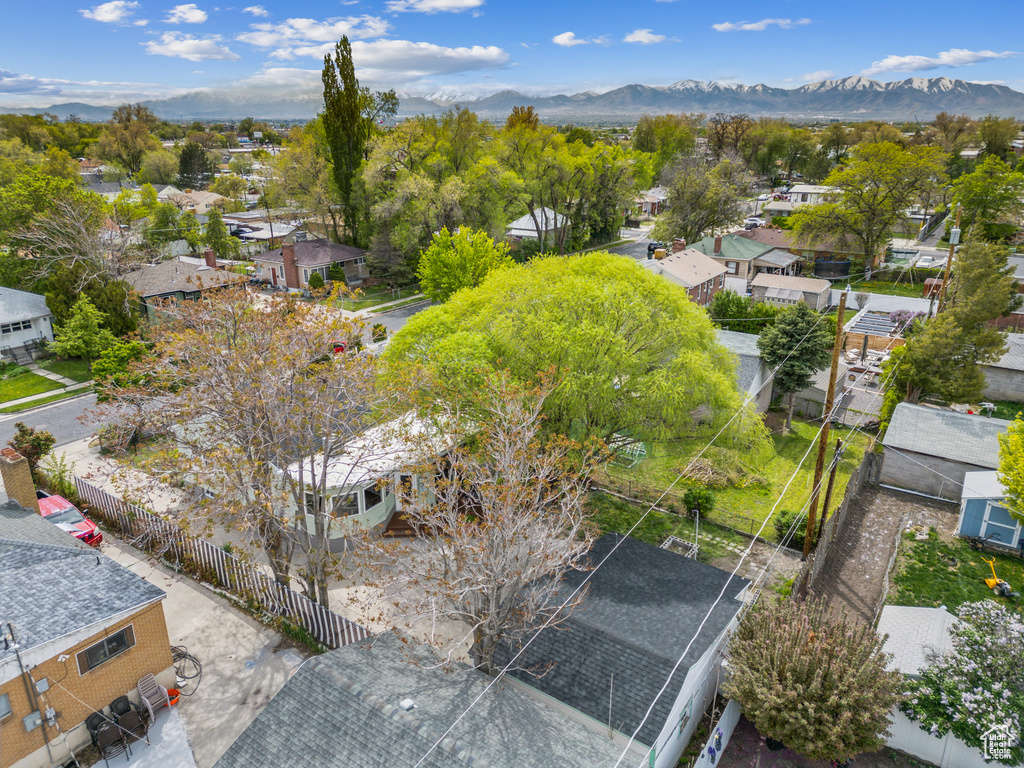 Drone / aerial view with a residential view and a mountain view