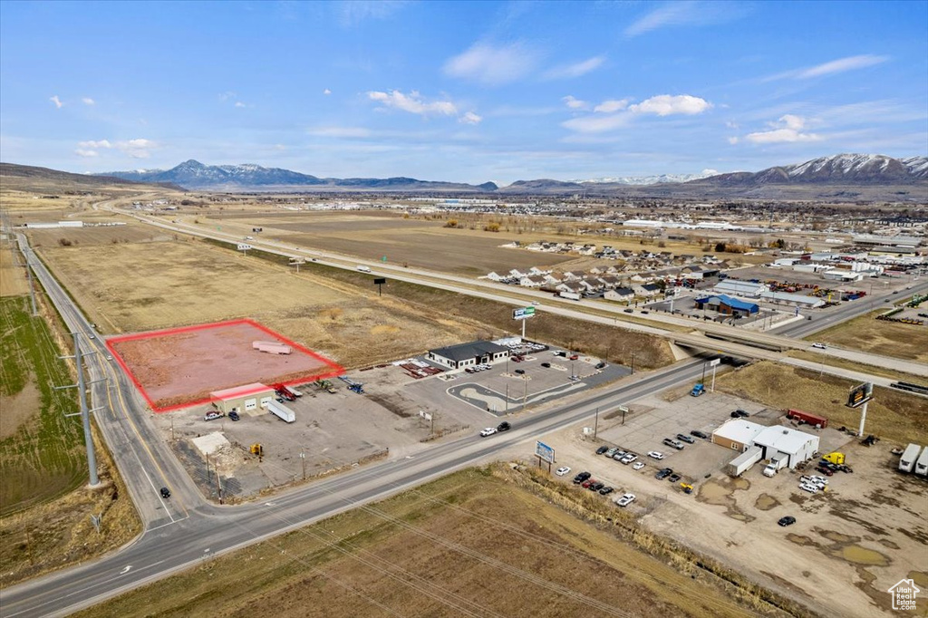 Birds eye view of property featuring a mountain view