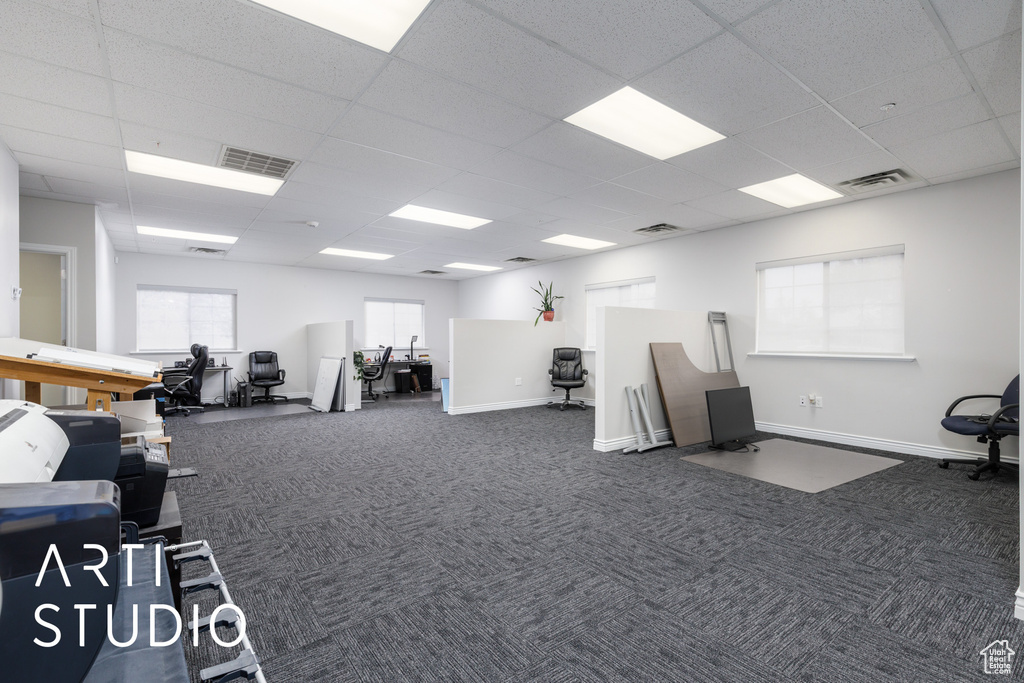 Miscellaneous room with visible vents, carpet flooring, a paneled ceiling, and baseboards