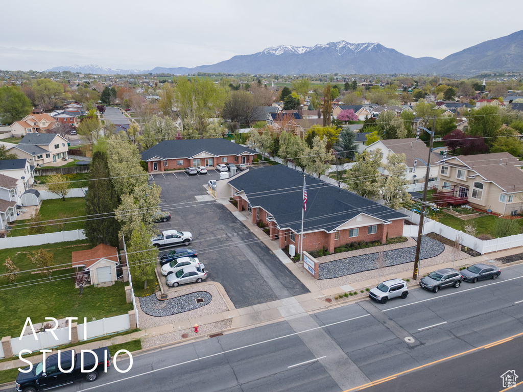 Aerial view featuring a residential view and a mountain view