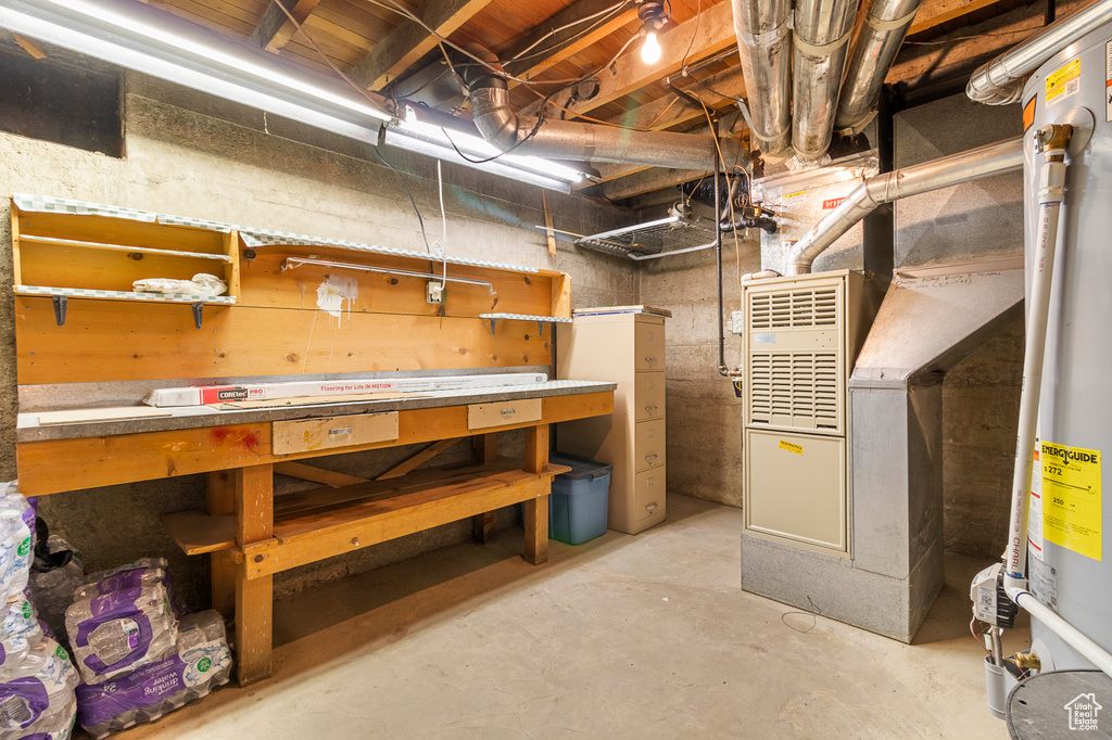 Unfinished basement with a workshop area
