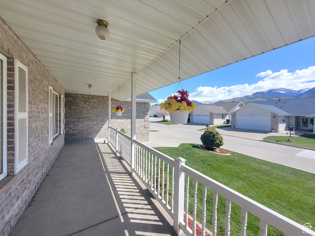 View of patio featuring covered porch and a residential view