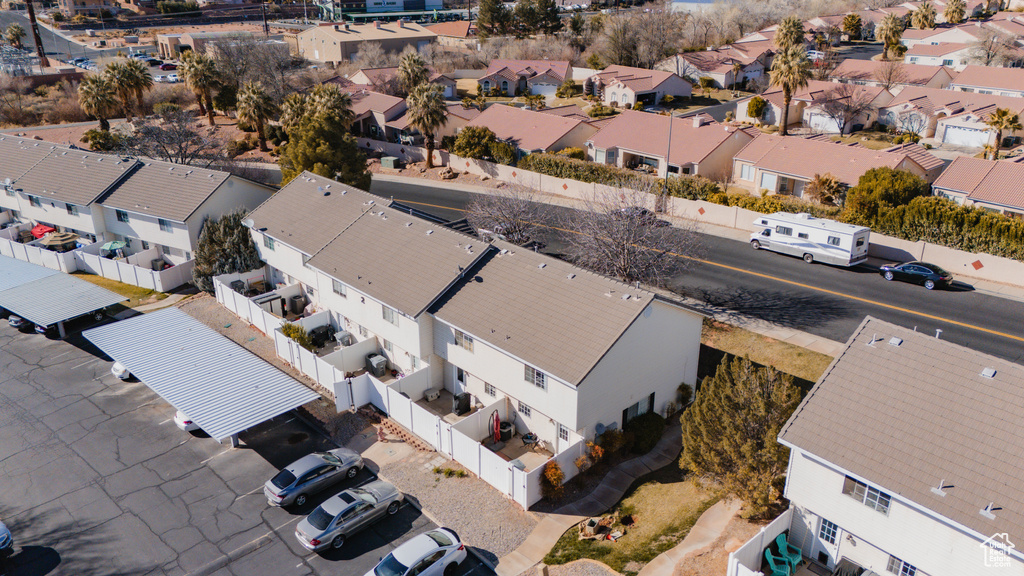Birds eye view of property with a residential view