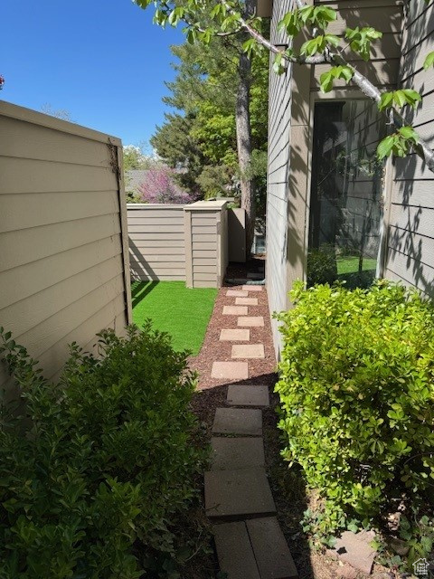 View of yard with fence