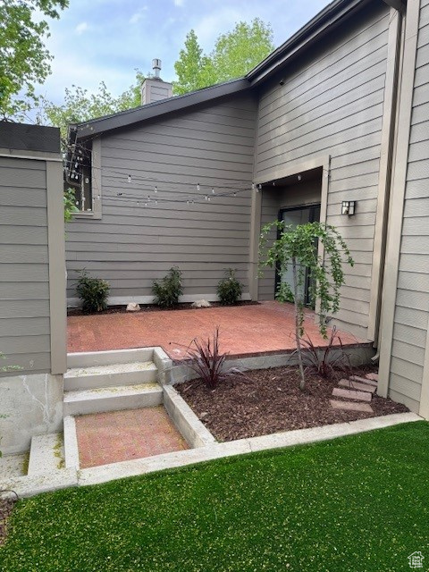 View of yard with a patio