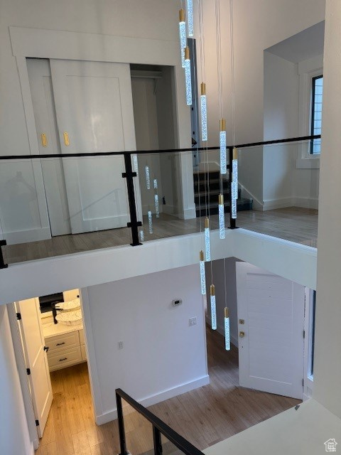 Interior space featuring baseboards and wood finished floors